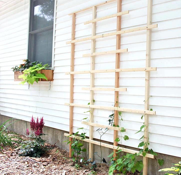 trellis next to house trellis made from scrap pieces of wood