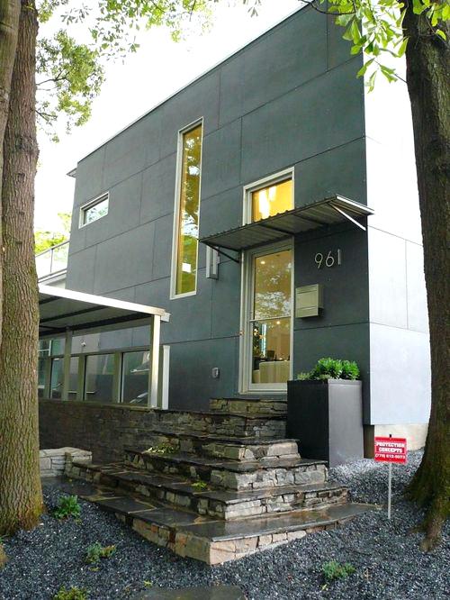 contemporary metal awnings example of a minimalist metal exterior home design in