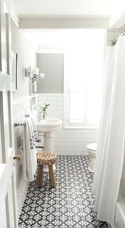 white subway tile bathroom bathroom with white subway tile and patterned floor tiles designed by vintage scout interiors